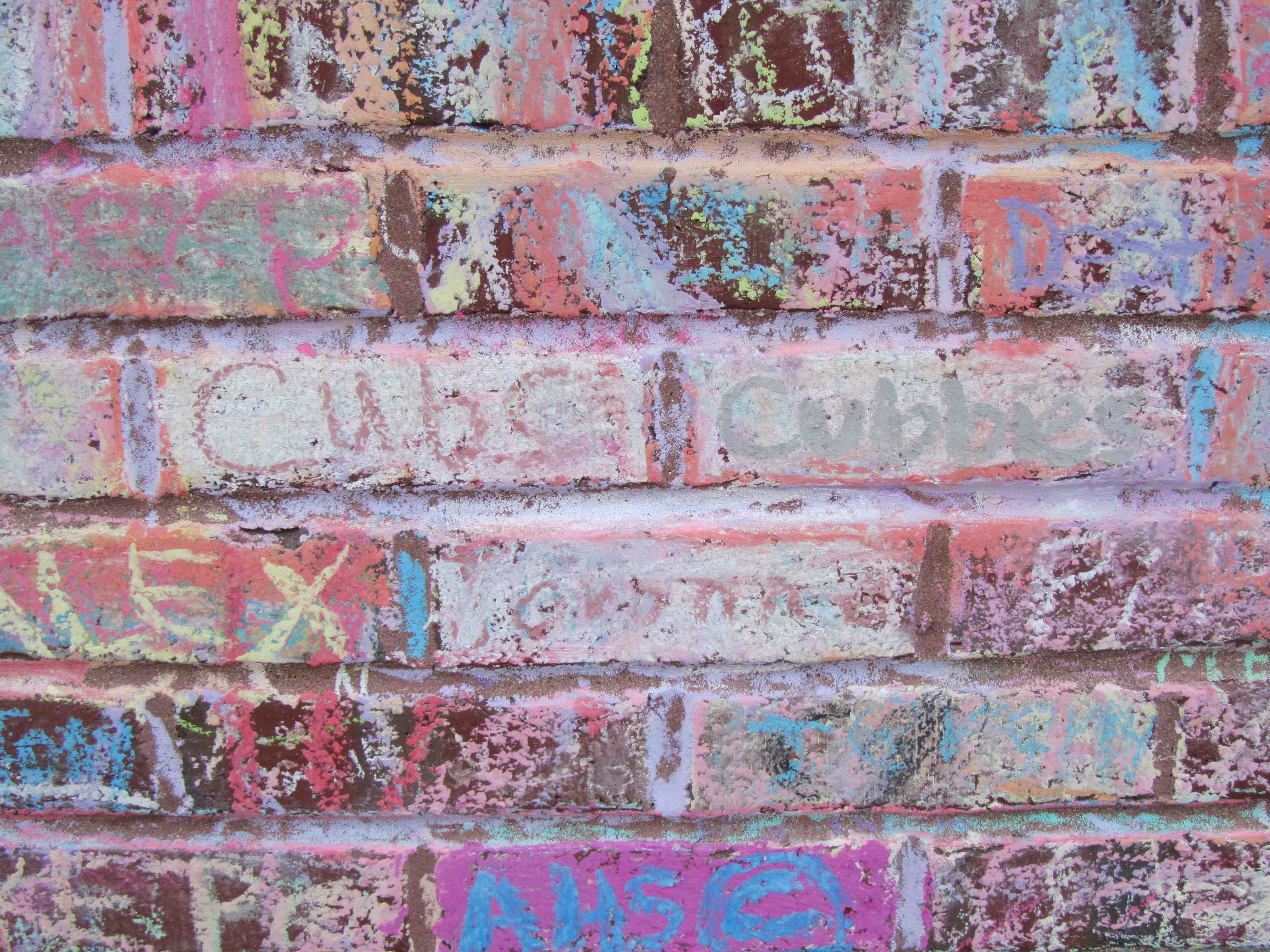 A chalk wall full of World Series championship memories outside Wrigley Field in 2016